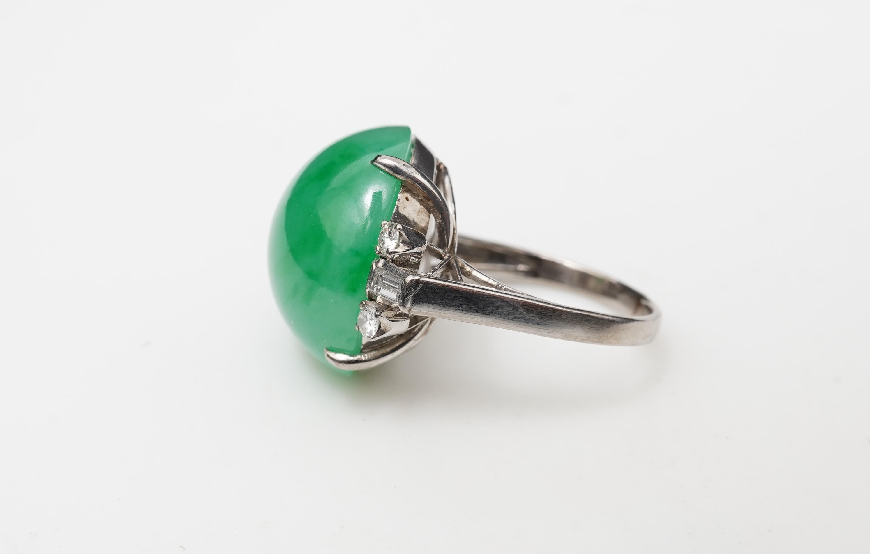 A jadeite and diamond ring
